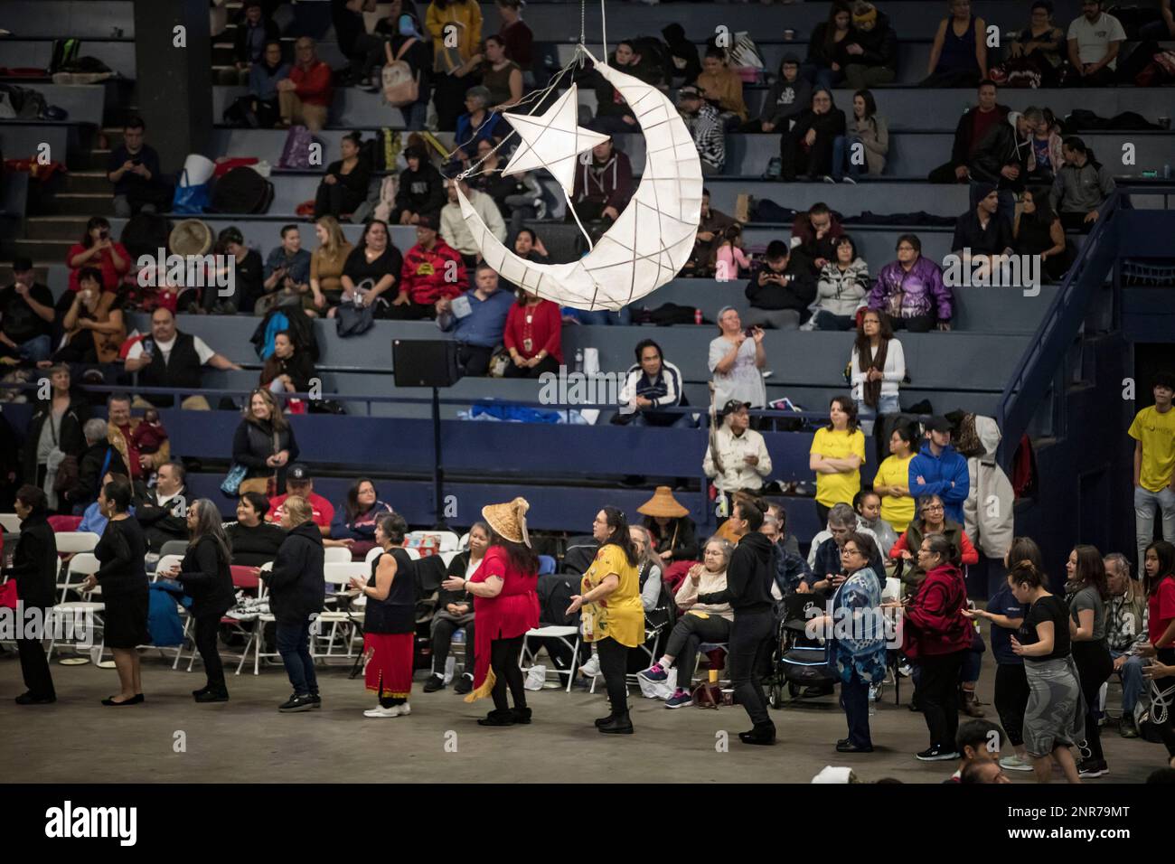 Dancers perform as people from the Tseshaht First Nation drum during ...