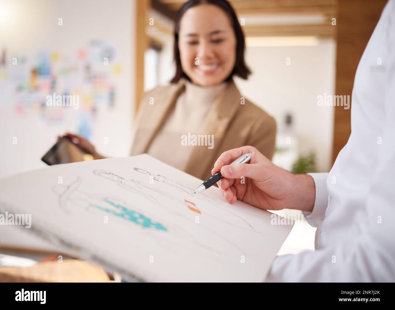 Hands, sketch book and drawing in fashion design, planning or rough draft for clothing line at the office. Hand of designer with pen writing Stock Photo