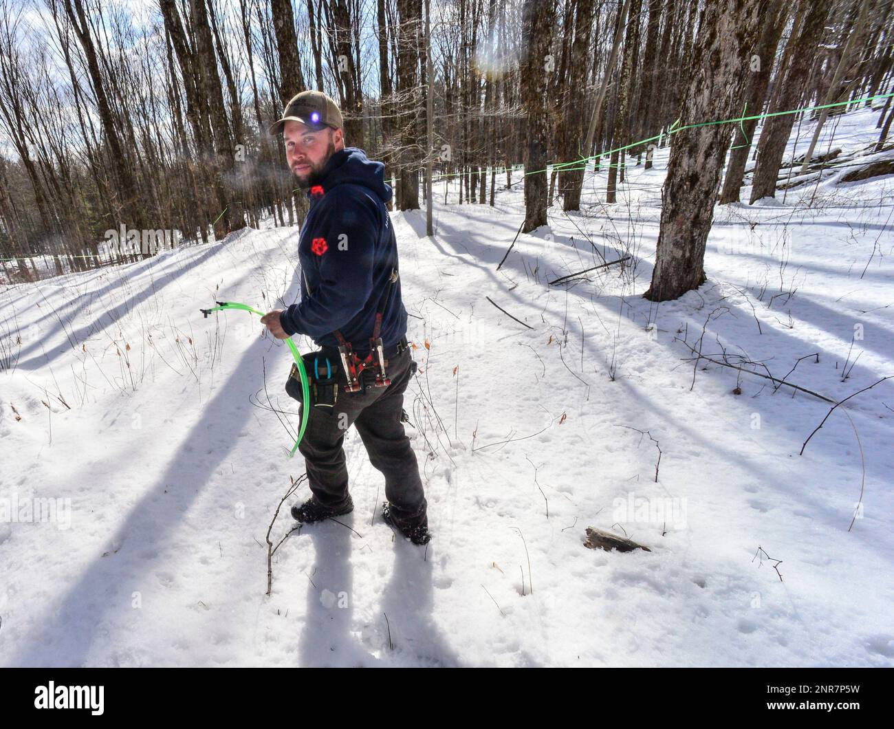 Todd Harlow, a manager at Harlow's Sugar House, in Putney, Vt., uses a