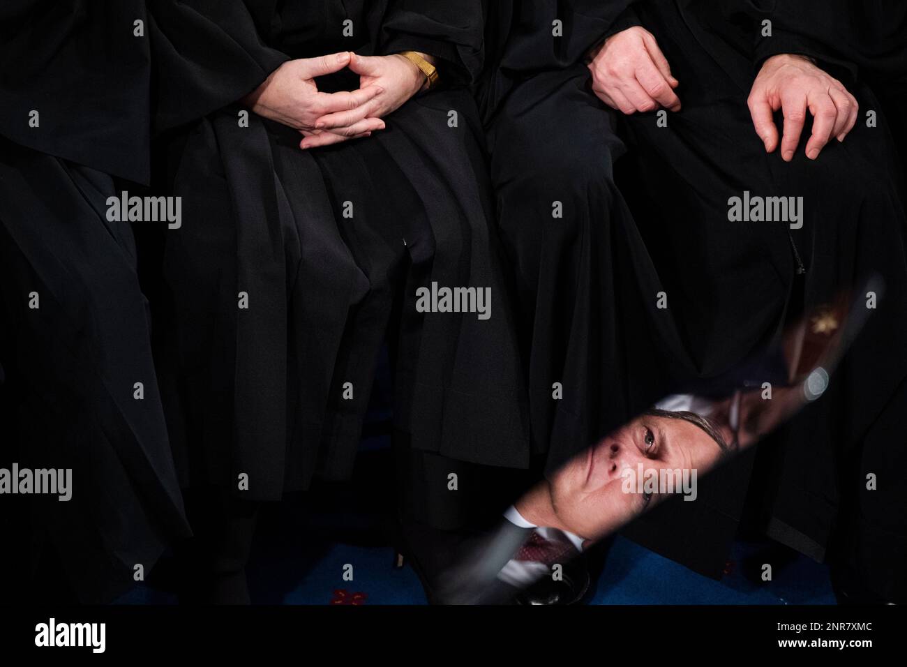 UNITED STATES FEBRUARY 04 Chief Justice John Roberts is reflected in