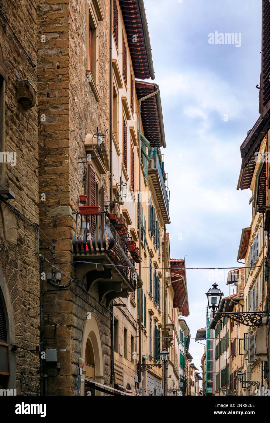 Medieval Renaissance gothic buildings along a narrow street in Oltrarno Santo Spirito area of Centro Storico or Historic Centre of Florence, Italy Stock Photo