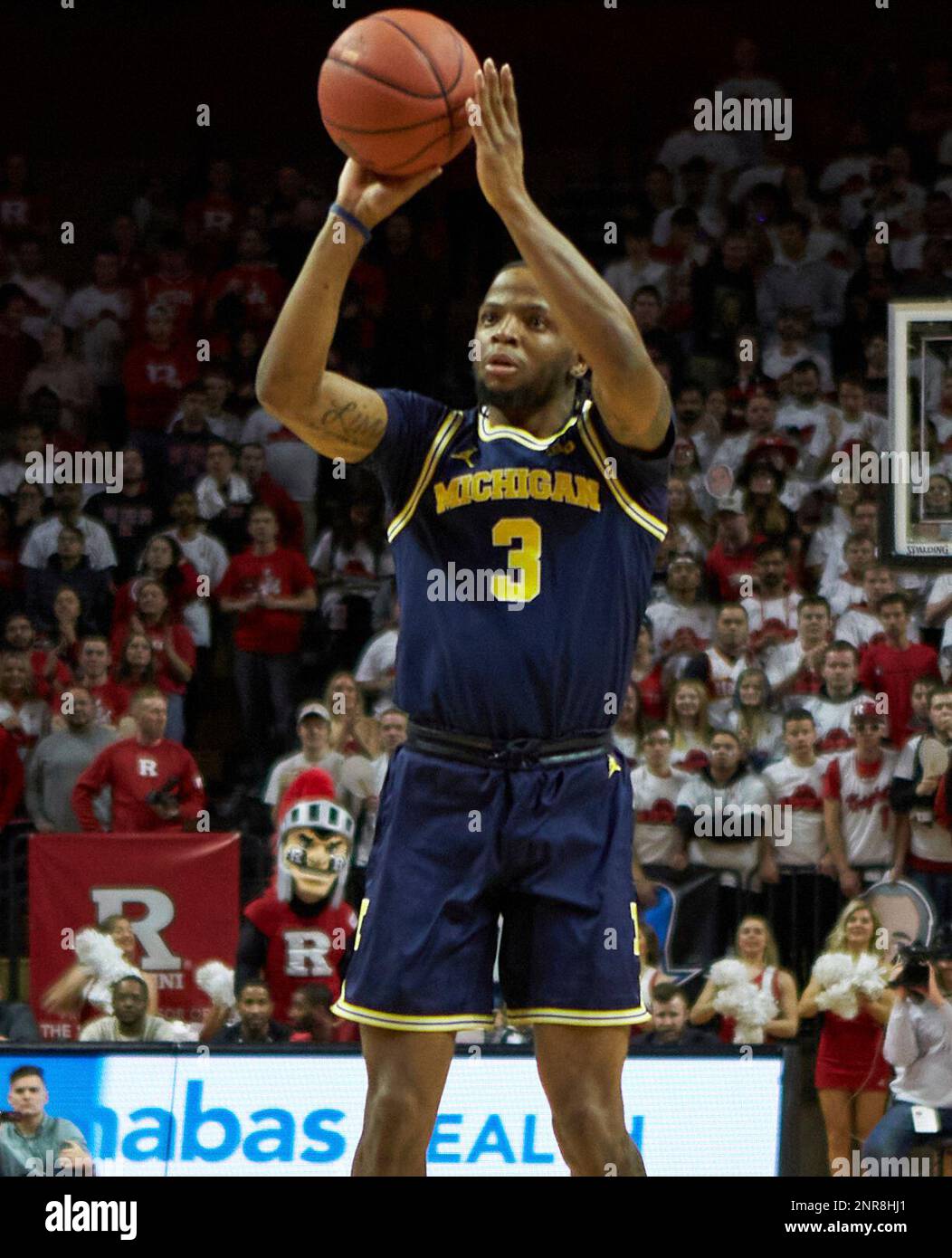 February 19, 2020, Piscataway, New Jersey, USA: Michigan Wolverines guard Zavier  Simpson (3) takes a shot in the first half during NCAA basketball action at  the Rutgers Scarlet Knights at Rutgers Athletic