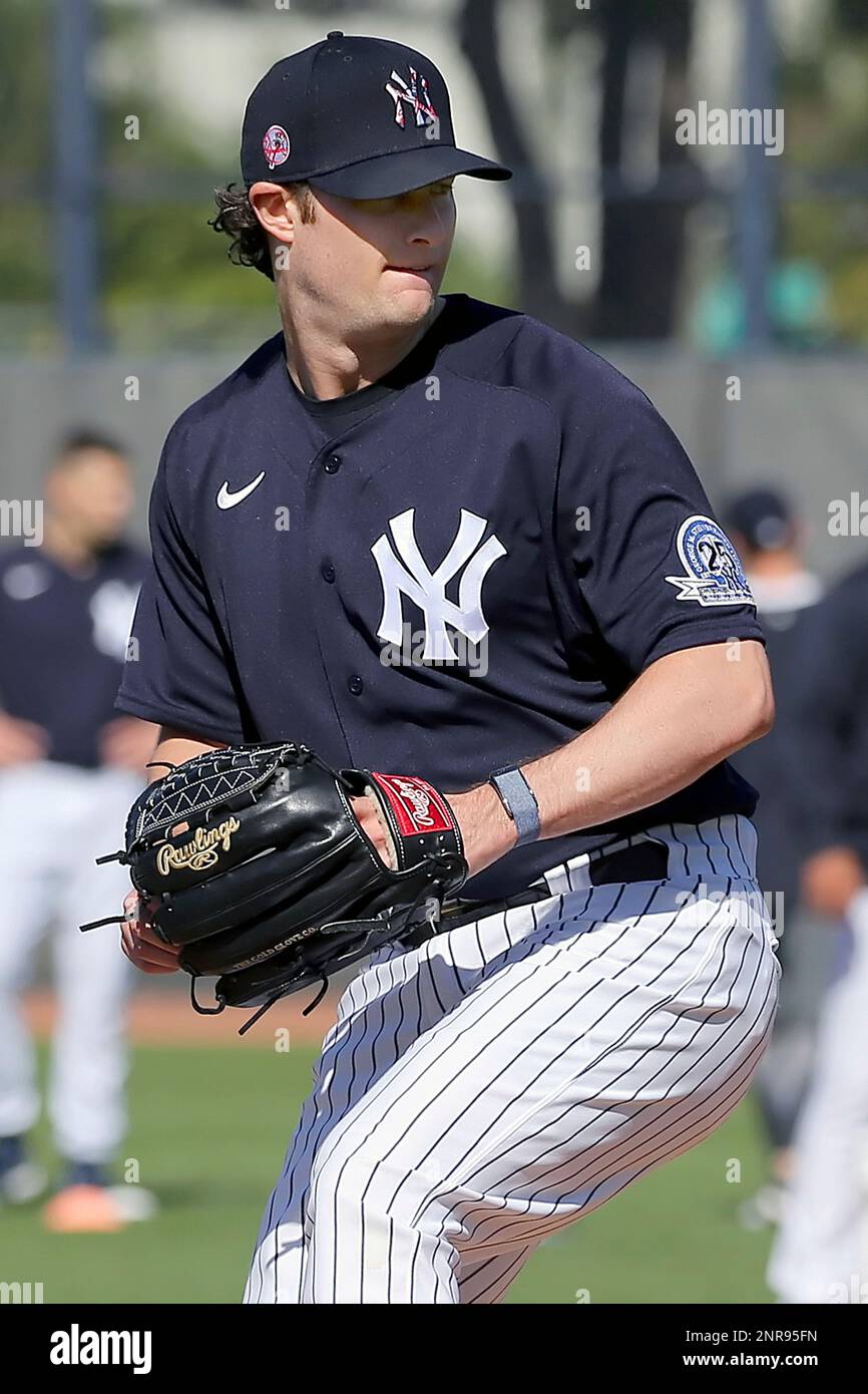 TAMPA, FL - FEBRUARY 15: Gerrit Cole (45) of the Yankees goes thru a drill  during the New York Yankees spring training work out on February 15, 2020,  at the George M.