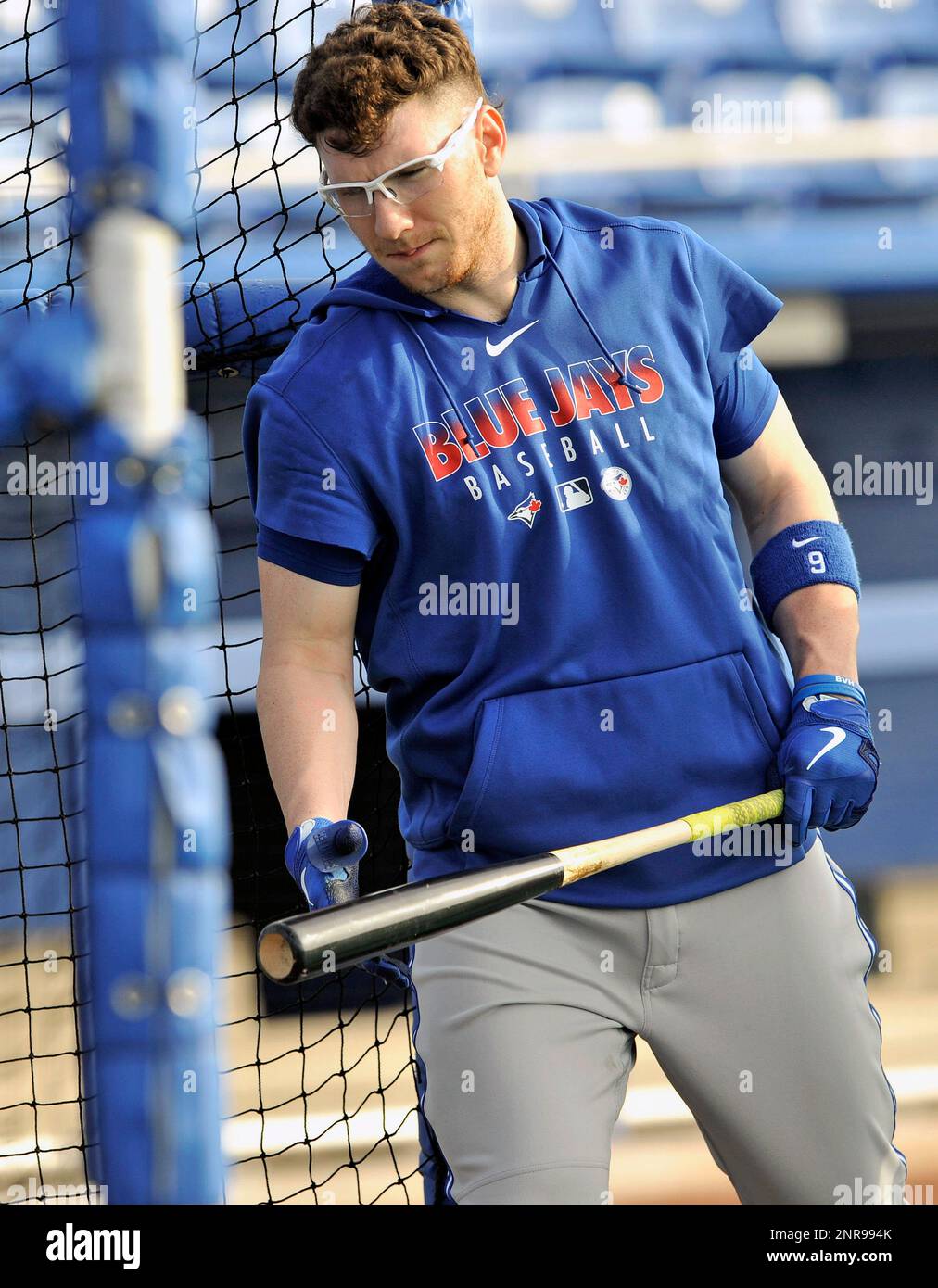 Toronto Blue Jays catcher Danny Jansen (9) gives a forearm bump to