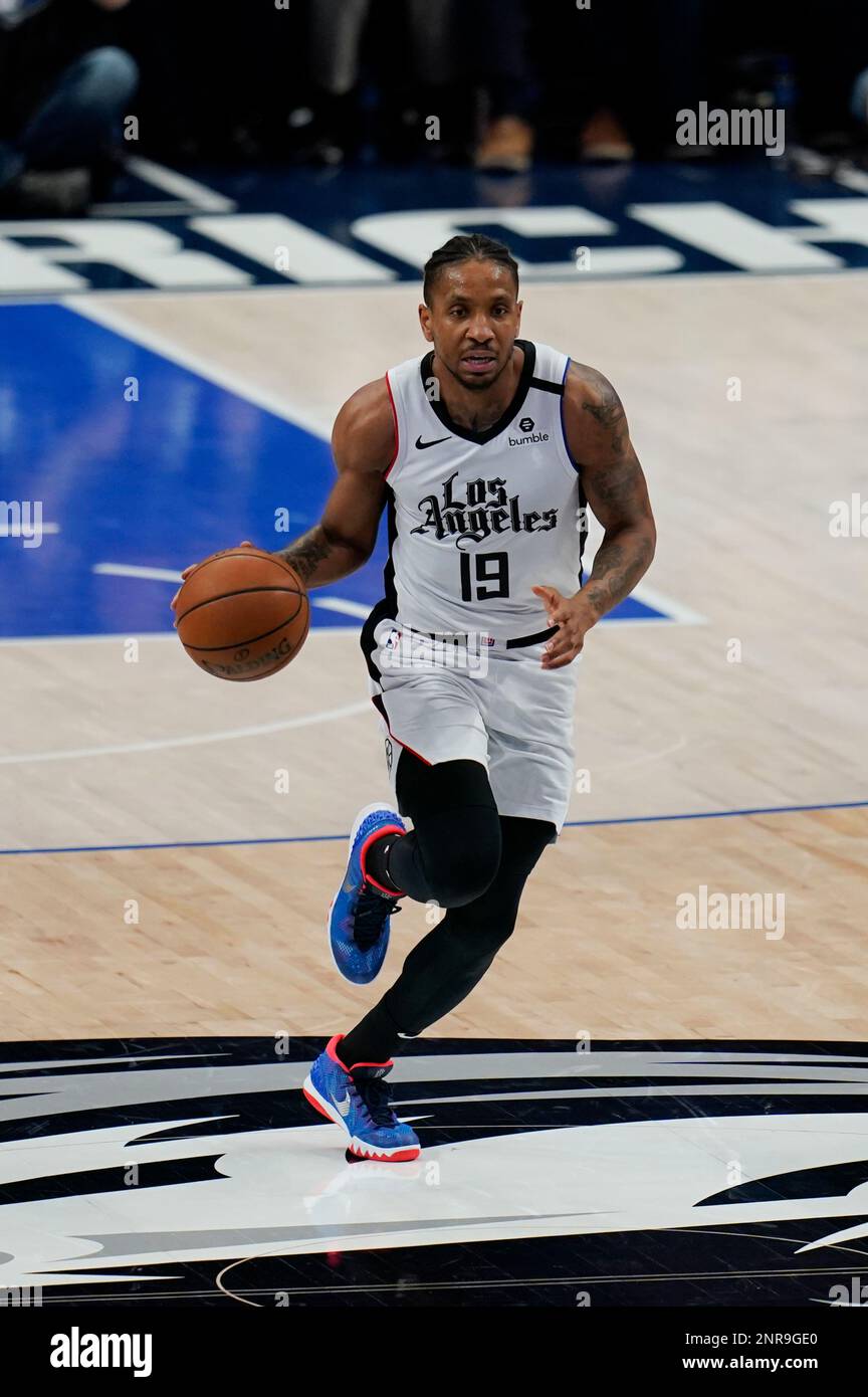 Los Angeles Clippers guard Rodney McGruder (19) brings the ball up court during an NBA basketball game against the Dallas Mavericks on Tuesday, Jan. 21, 2020, in Dallas. (Matt Patterson via AP) Stock Photo