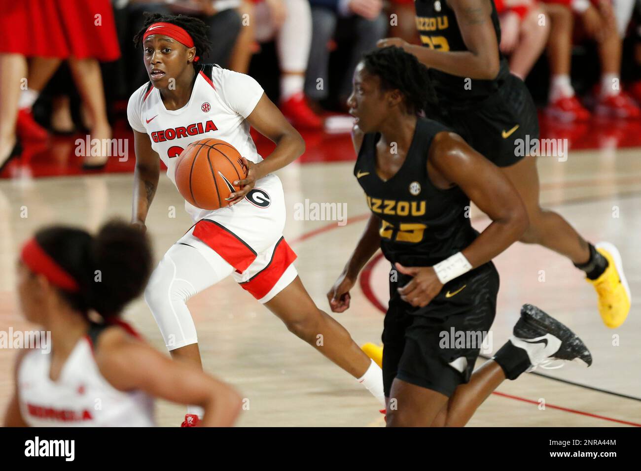 guard Que Morrison (23) moves the ball downcourt against