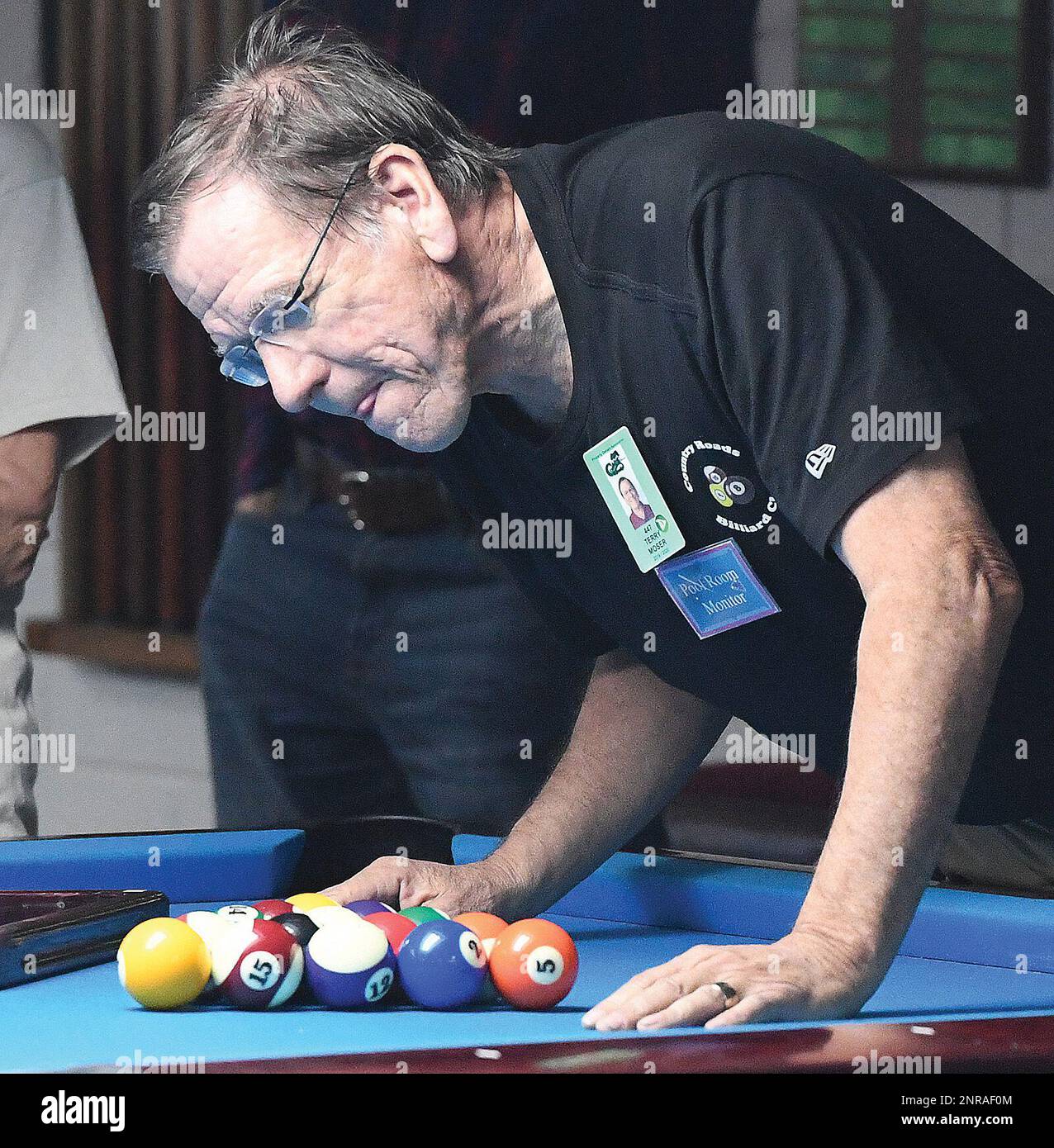Terry Moser, a Pool Room Monitor at Country Roads RV Village, checks a ...
