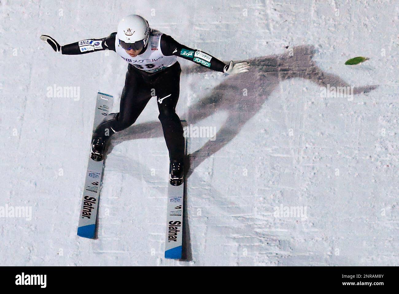 Japan's Yukiya Sato lands to win the individual ski jumping World Cup ...