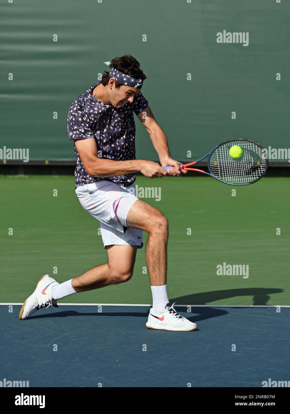 NEWPORT BEACH, CA - JANUARY 30: ATP tennis player Taylor Fritz (USA)  returns a shot during a match at the Oracle Challenger Series tennis  tournament played on January 30, 2020 at the