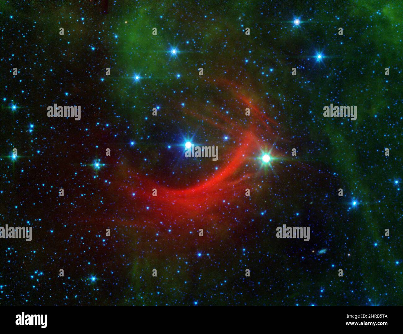 This image made available by NASA shows the runaway star Kappa Cassiopeiae, or HD 2905, center, and bow formed when the magnetic fields and wind of particles flowing off the