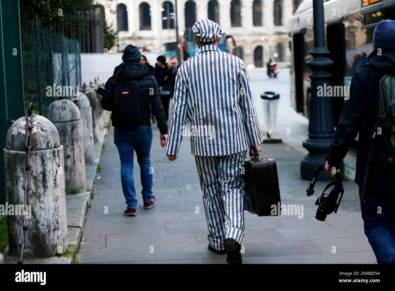 Actor Nicola Mette wears a striped uniform of the prisoners of Nazi