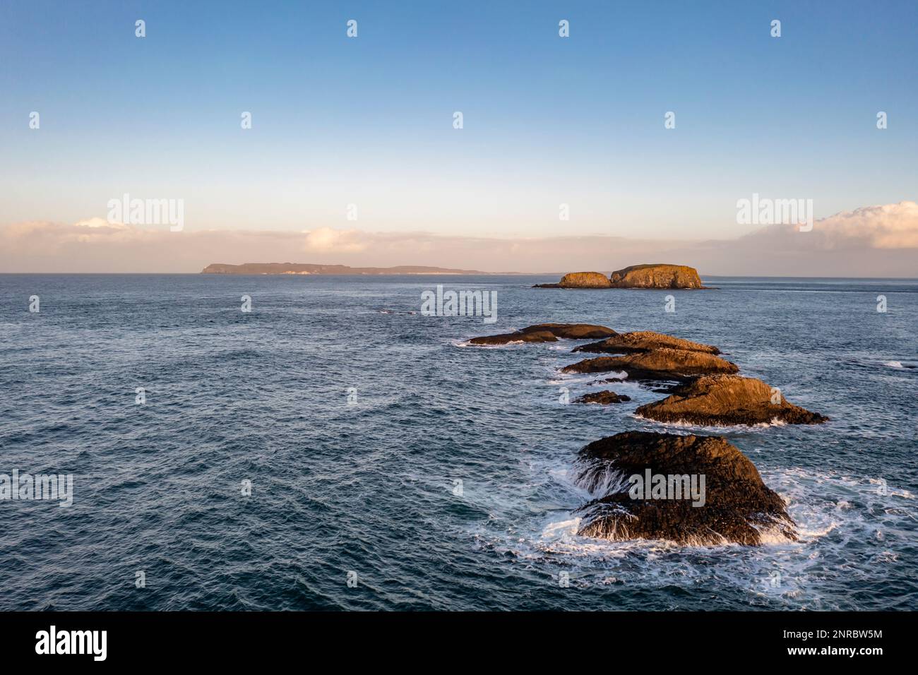 Aerial view of Sheep Island with Rathlin Island in the background , County. Antrim, Northern Ireland, UK. Stock Photo