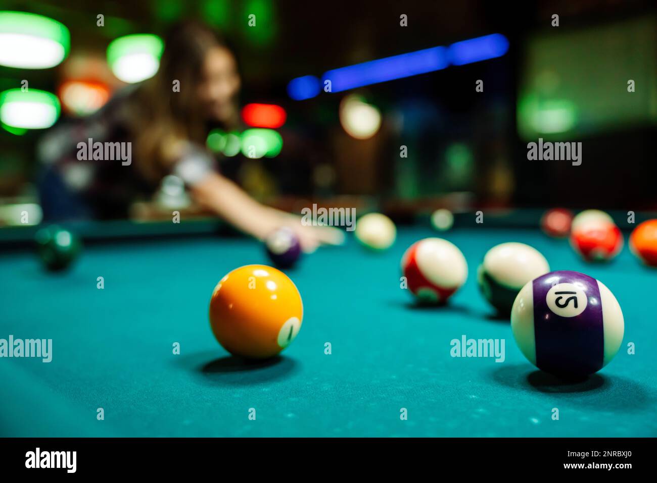 Preparing to break spheres into the pool pocket. People billiard ...