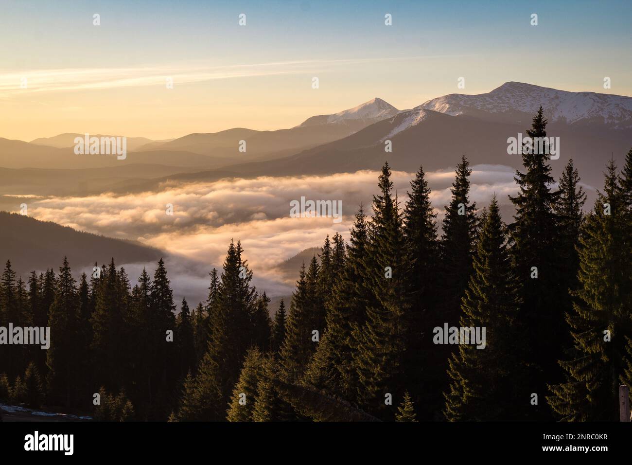 Over clouds view on snow capped mountain ranges landscape photo Stock ...
