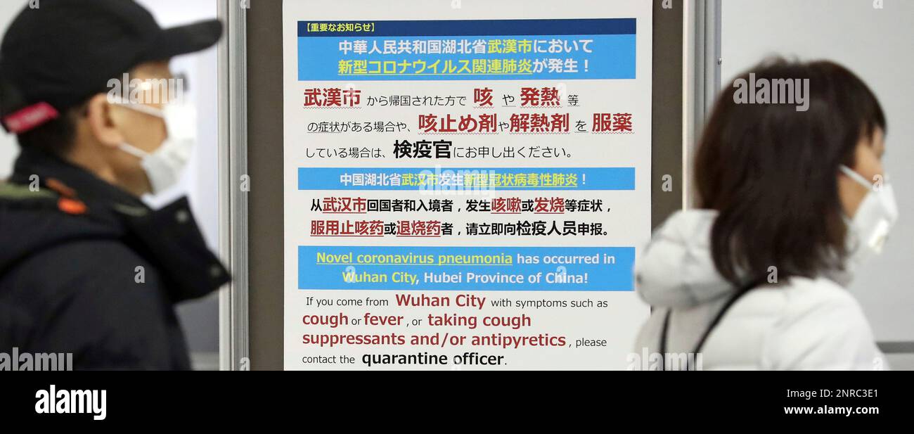 Passengers wearing mask pass at quarantine inspection during the time