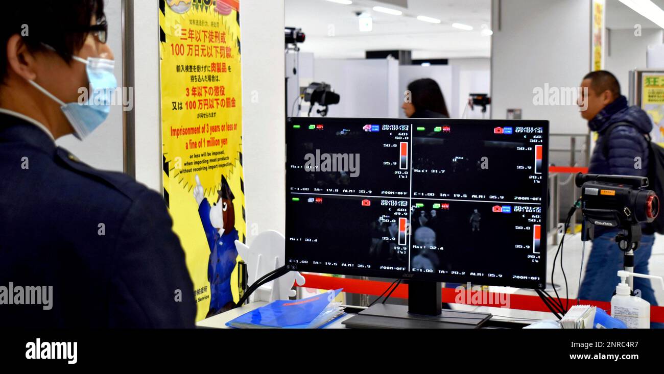 Passengers wearing mask pass at quarantine inspection during the time