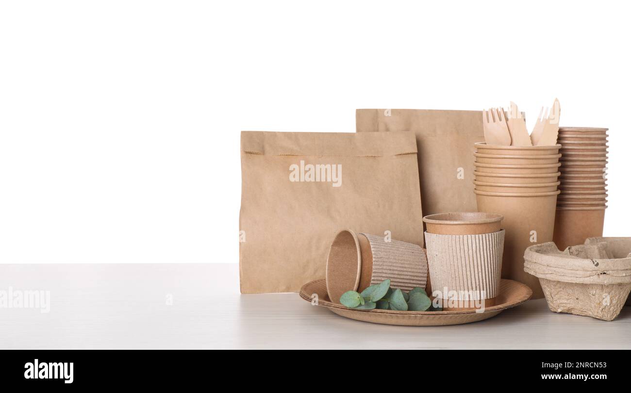 Set of disposable eco friendly dishware on white background Stock Photo ...