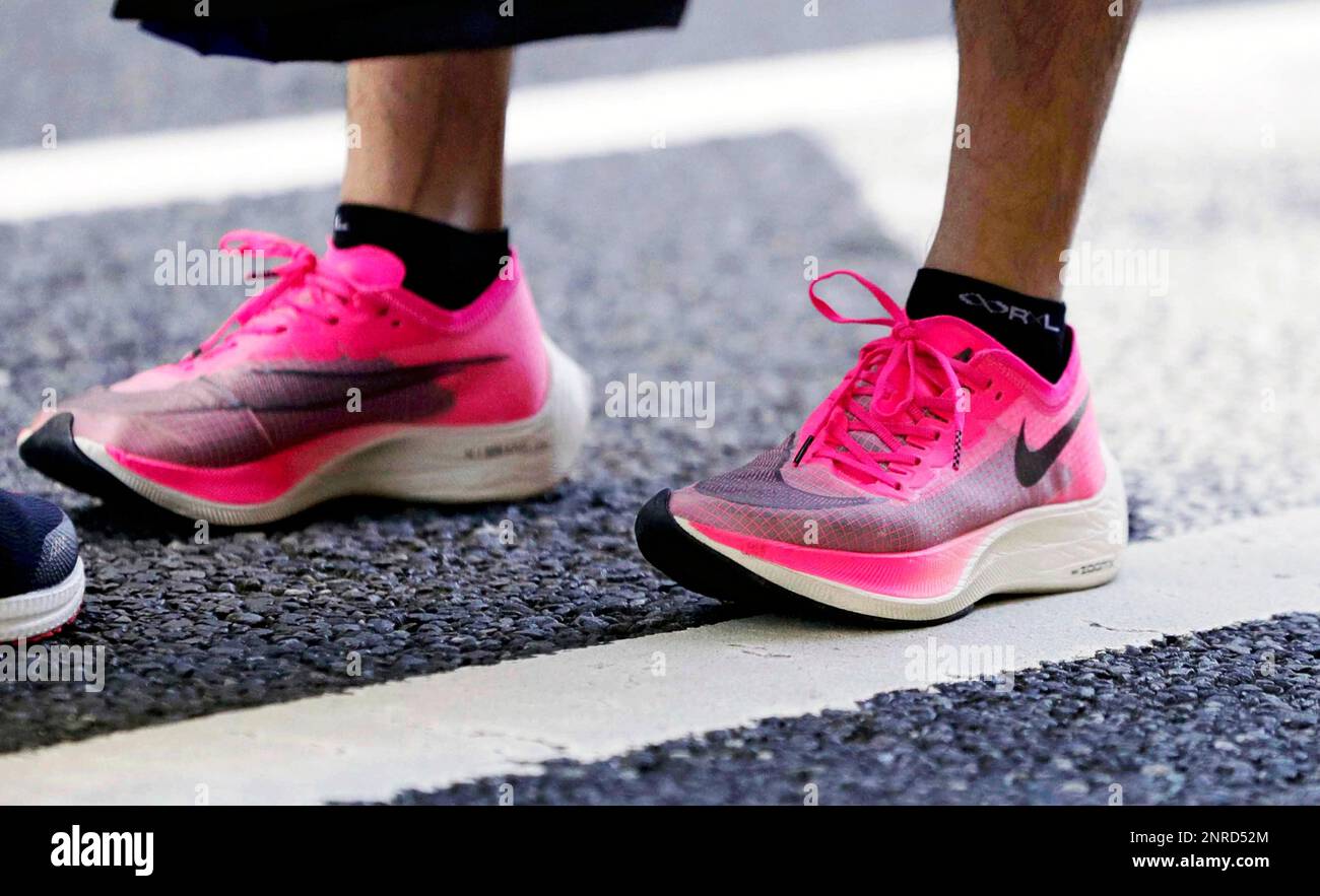 An athlete wears NIKE shoes "VAPORFLY (VF)" during the 96th Tokyo-Hakone  Round-Trip College Ekiden Race in Tokyo on January 2, 2020. Approximately  85 percent runners wore NIKE VAPORFLY (VF) platform shoes, so
