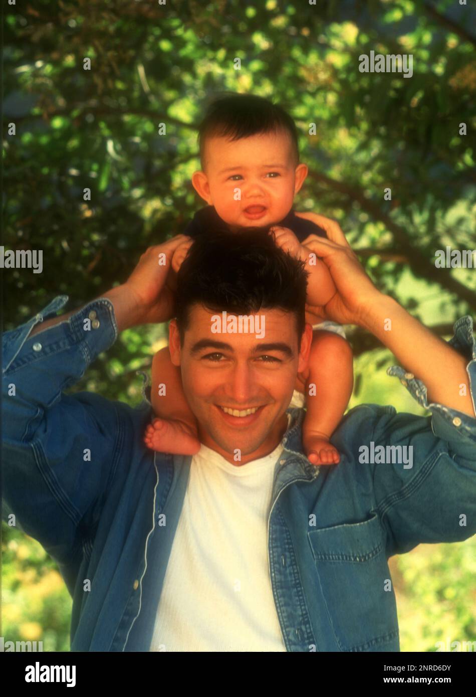 Los Angeles, California, USA 1st July 1996 (EXCLUSIVE) Actor Kyle Candler and daughter Sydney Chandler pose at an exclusive photo shoot on July 1, 1996 in Los Angeles, California, USA. Photo by Barry King/Alamy Stock Photo Stock Photo