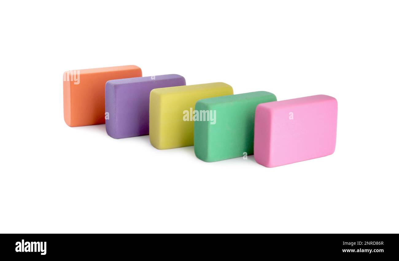 Row of bright erasers on white background Stock Photo - Alamy