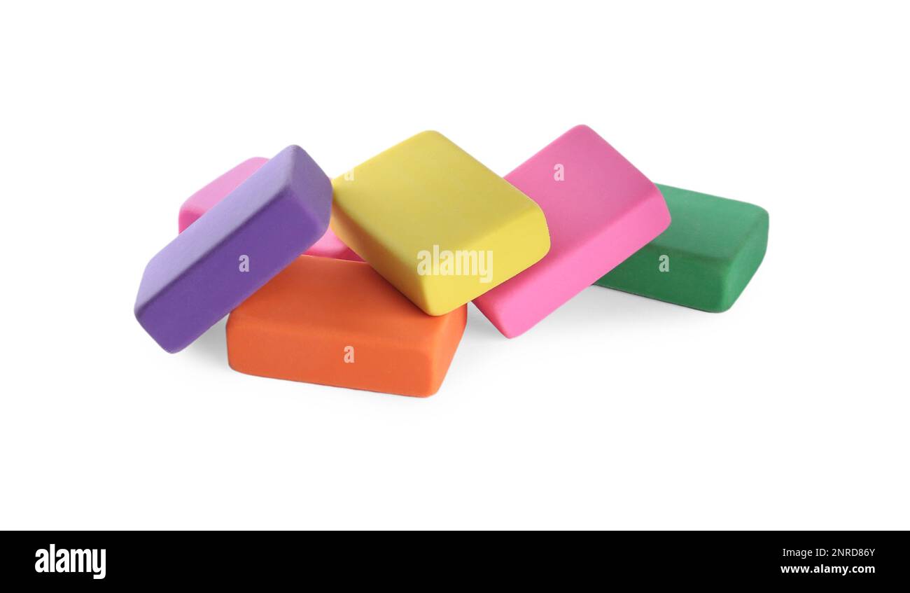 Pile of bright erasers on white background Stock Photo - Alamy