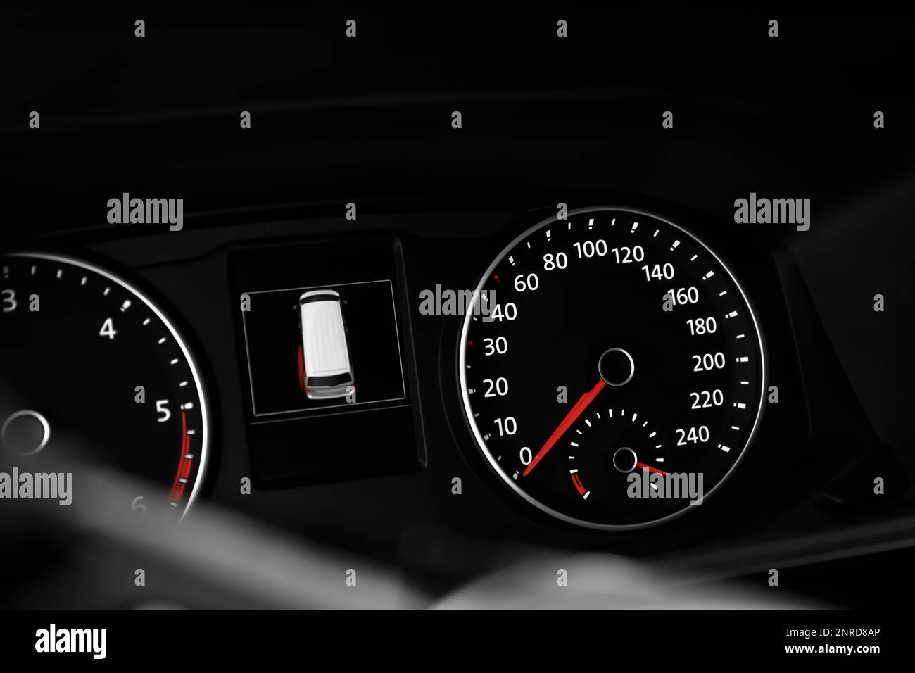 Modern speedometer, tachometer and open door warning sign on car dashboard Stock Photo Alamy