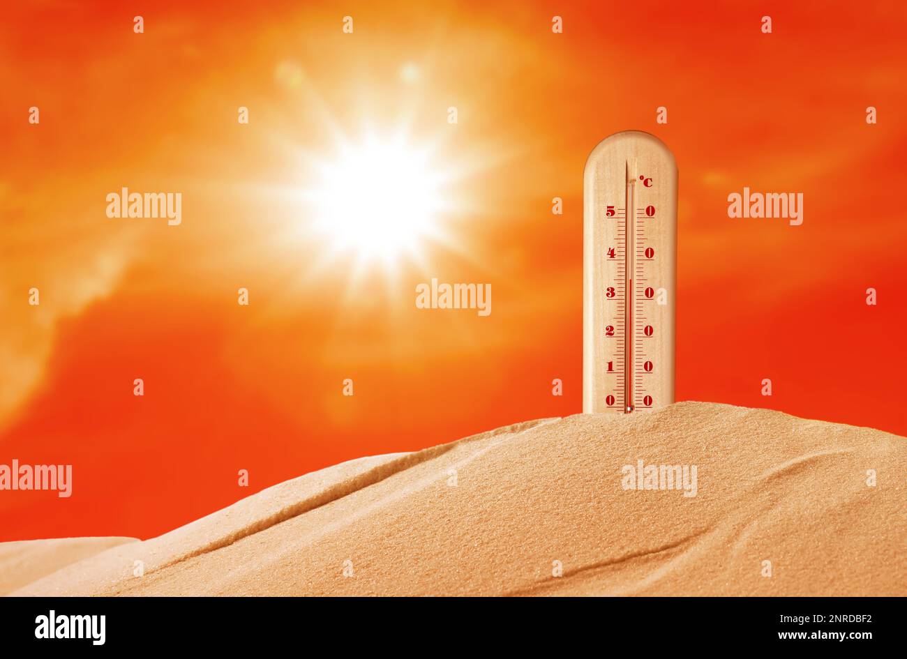 Weather thermometer with high temperature outdoors on hot sunny day