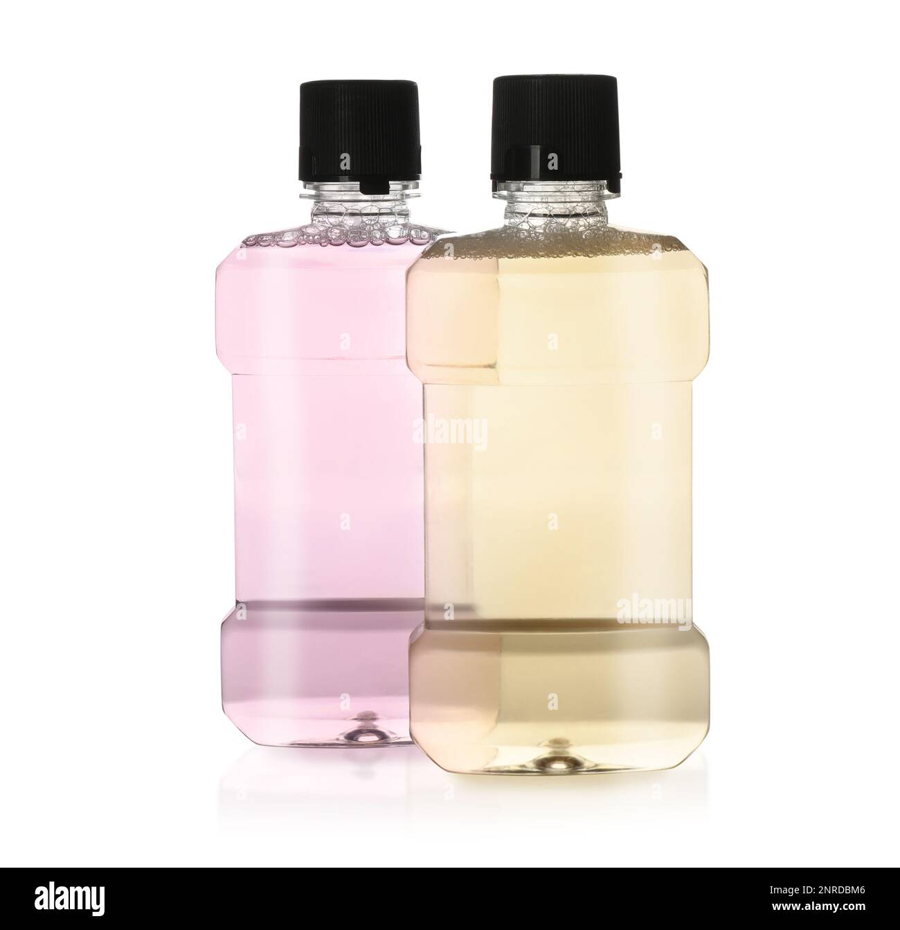 Bottles with mouthwash for teeth care on white background Stock Photo
