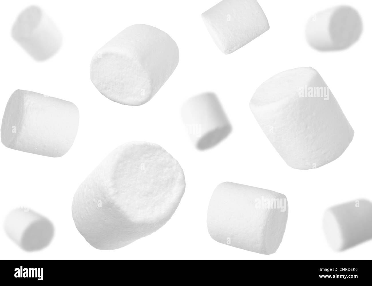 Delicious sweet puffy marshmallows flying on white background Stock ...