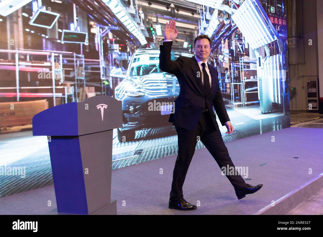 Elon Musk walks off the lectern after a speech at the delivery ceremony ...