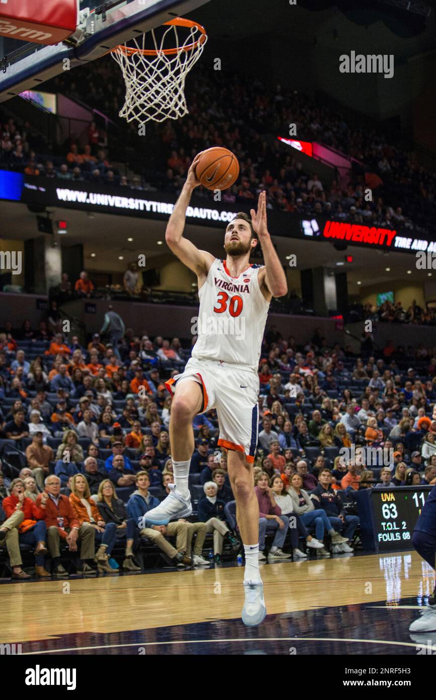 December 29, 2019: Virginia Cavaliers forward Jay Huff (30) goes up for a  dunk to close out NCAA basketball action between the Navy Midshipmen and  the Virginia Cavaliers at John Paul Jones