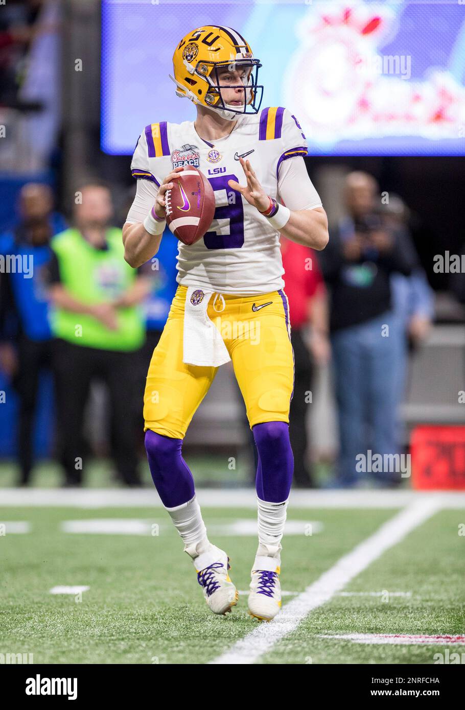 December 28, 2019: LSU's Joe Burrow (9) delivers a pass during the  Chick-Fil-A Peach Bowl - a College Football Playoff Nationall Semifinal -  featuring the Oklahoma Sooners and the LSU Tigers, played