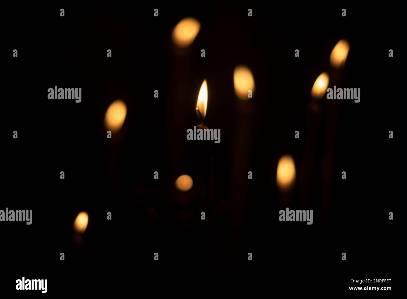 Candles burn in dark. Candle lights Stock Photo Alamy