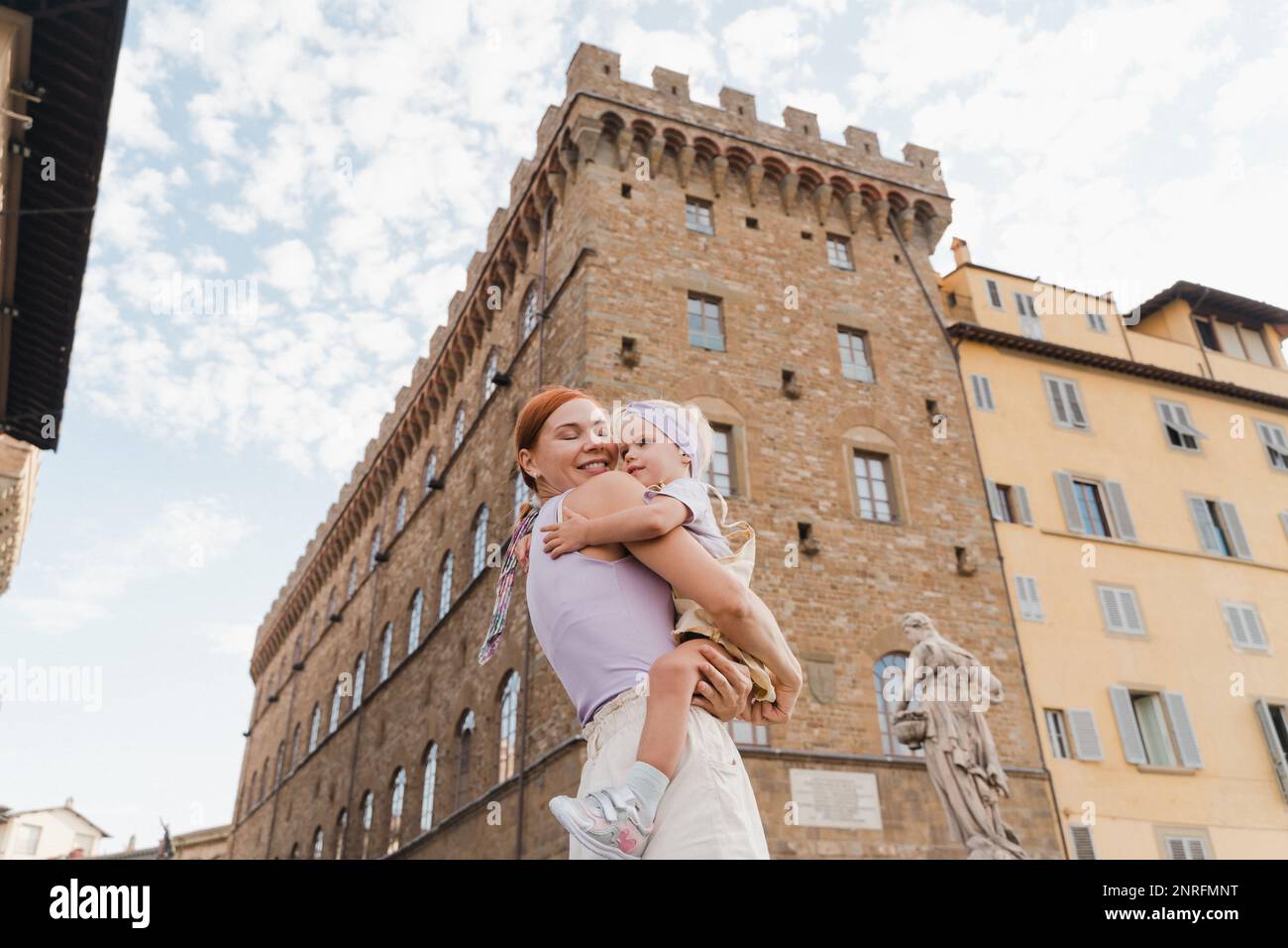 A woman with a little toddler girl visits Florence, Italy. Stock Photo
