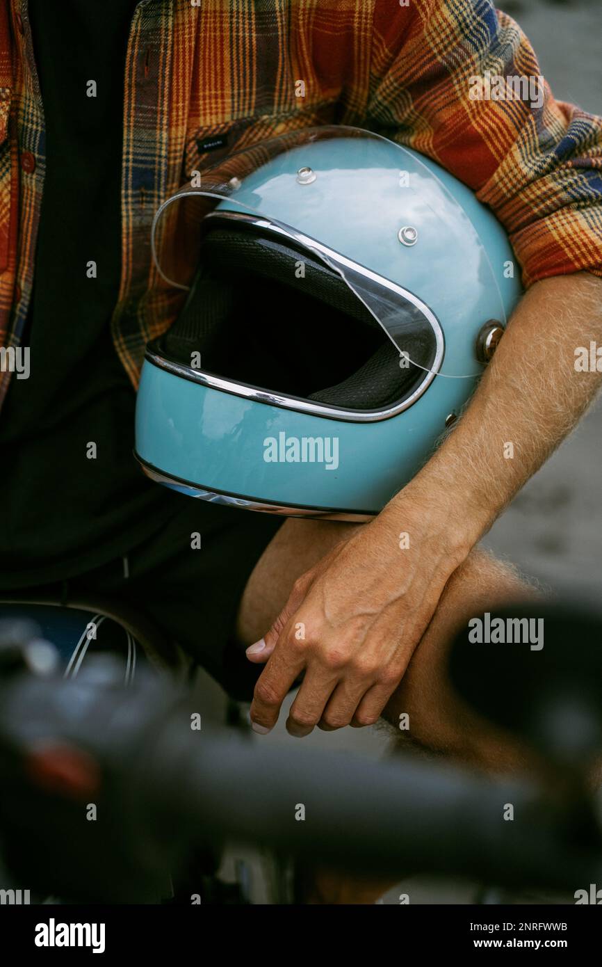 cutout man holding motorcycle helmet Motorcycle helmet cut out hi-res stock photography and images