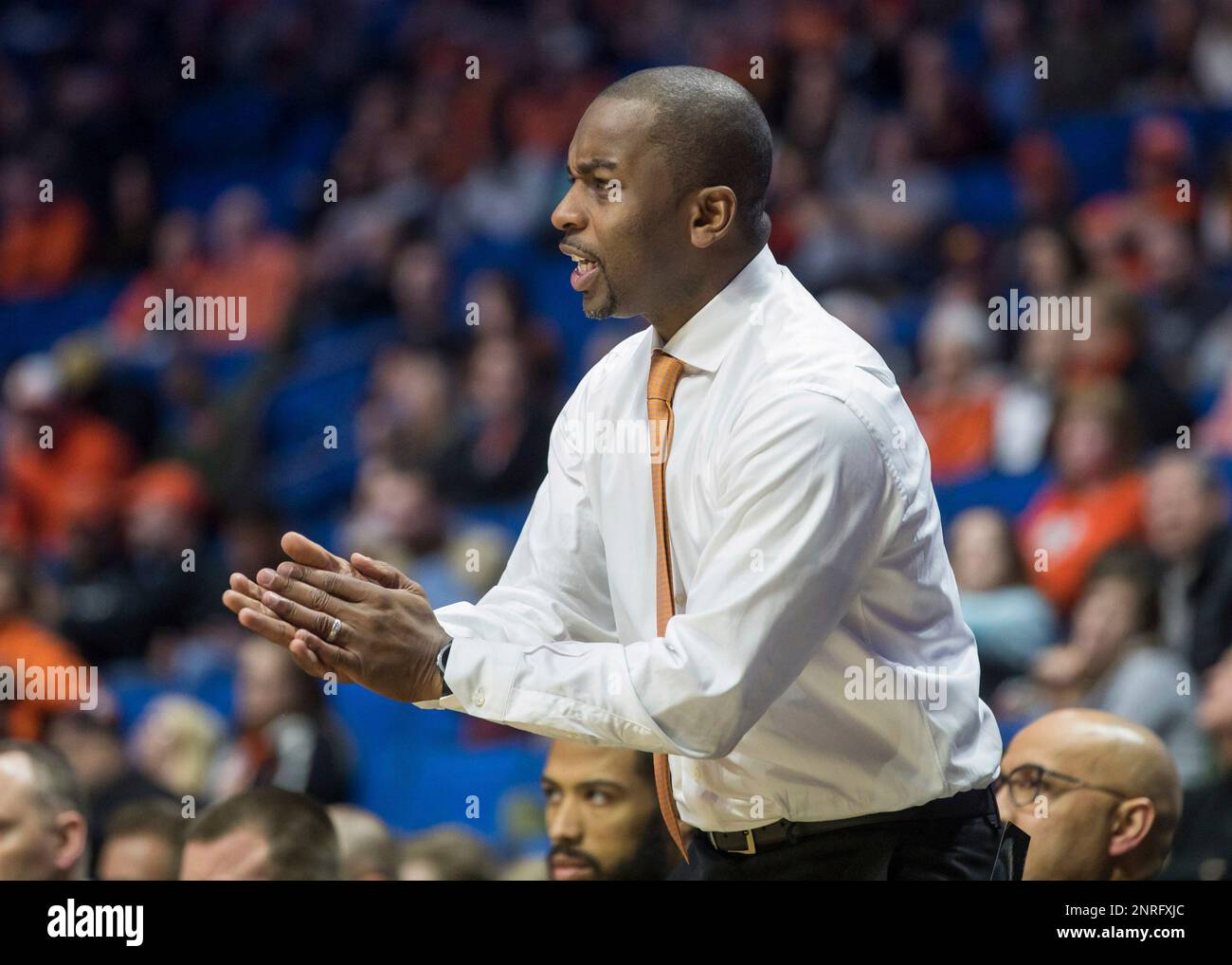 Oklahoma State coach Mike Boynton Jr. claps during the team's NCAA