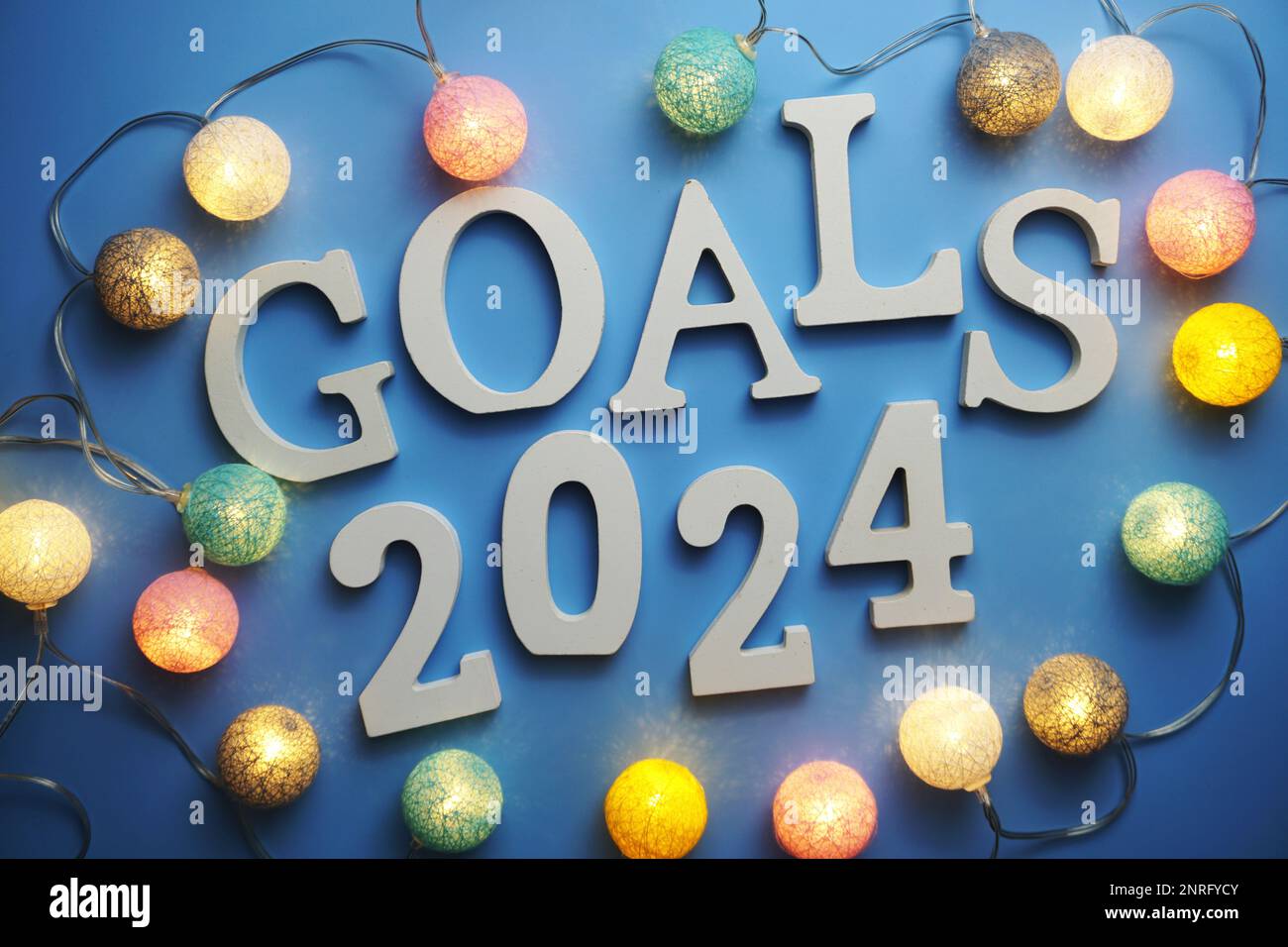 Goals for 2024 alphabet letter on blue background Stock Photo Alamy