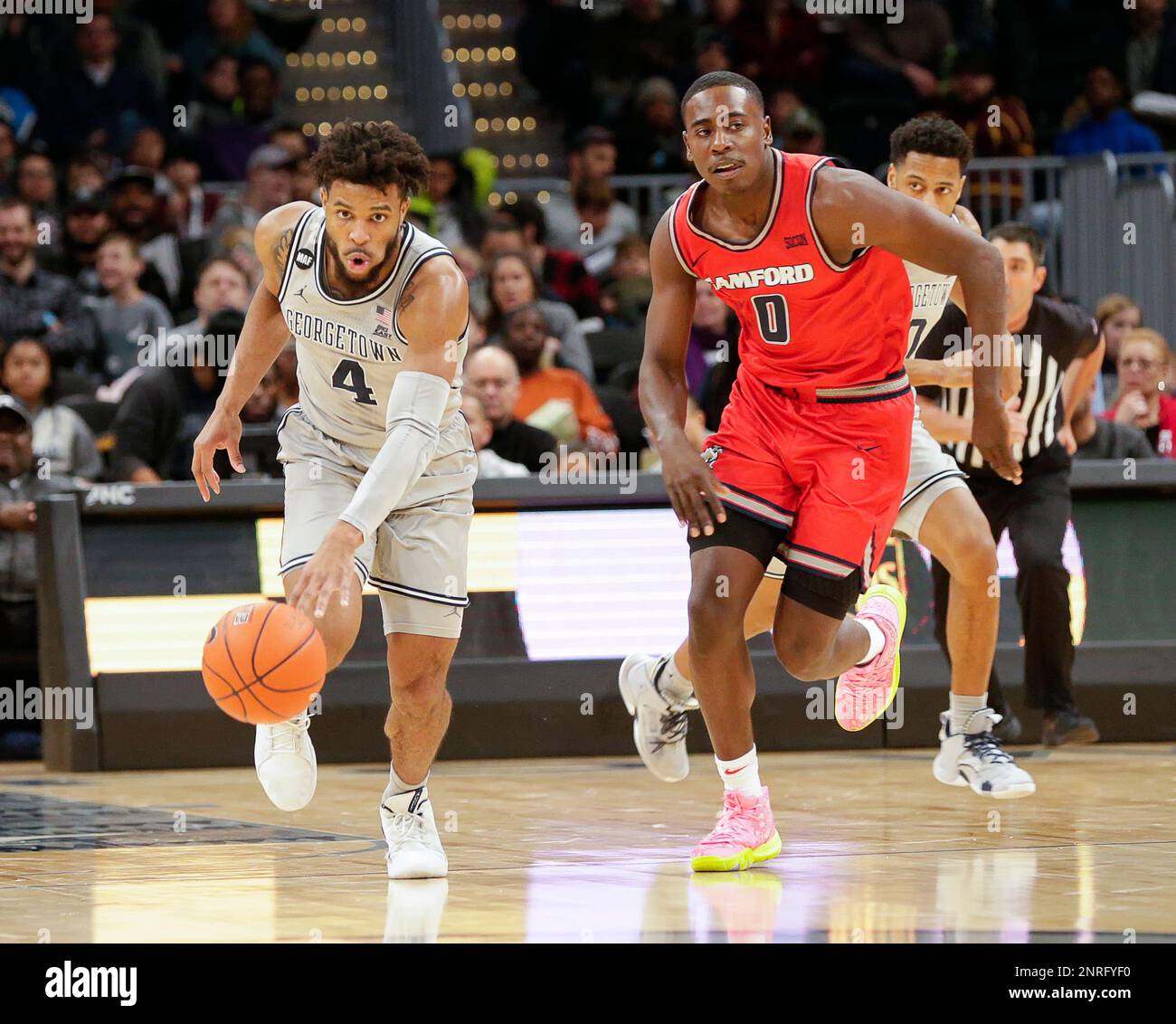 December 21, 2019: Georgetown Hoyas G (4) Jagan Mosely chases down the ball  during a NCAA Men's Basketball game between the Georgetown Hoyas and the  Samford Bulldogs at the Capital One Arena