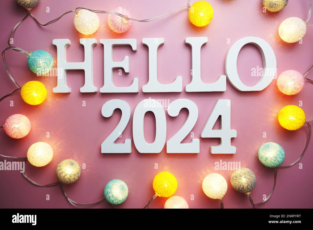 Hello 2024 alphabet letter with cotton ball LED decoration on pink