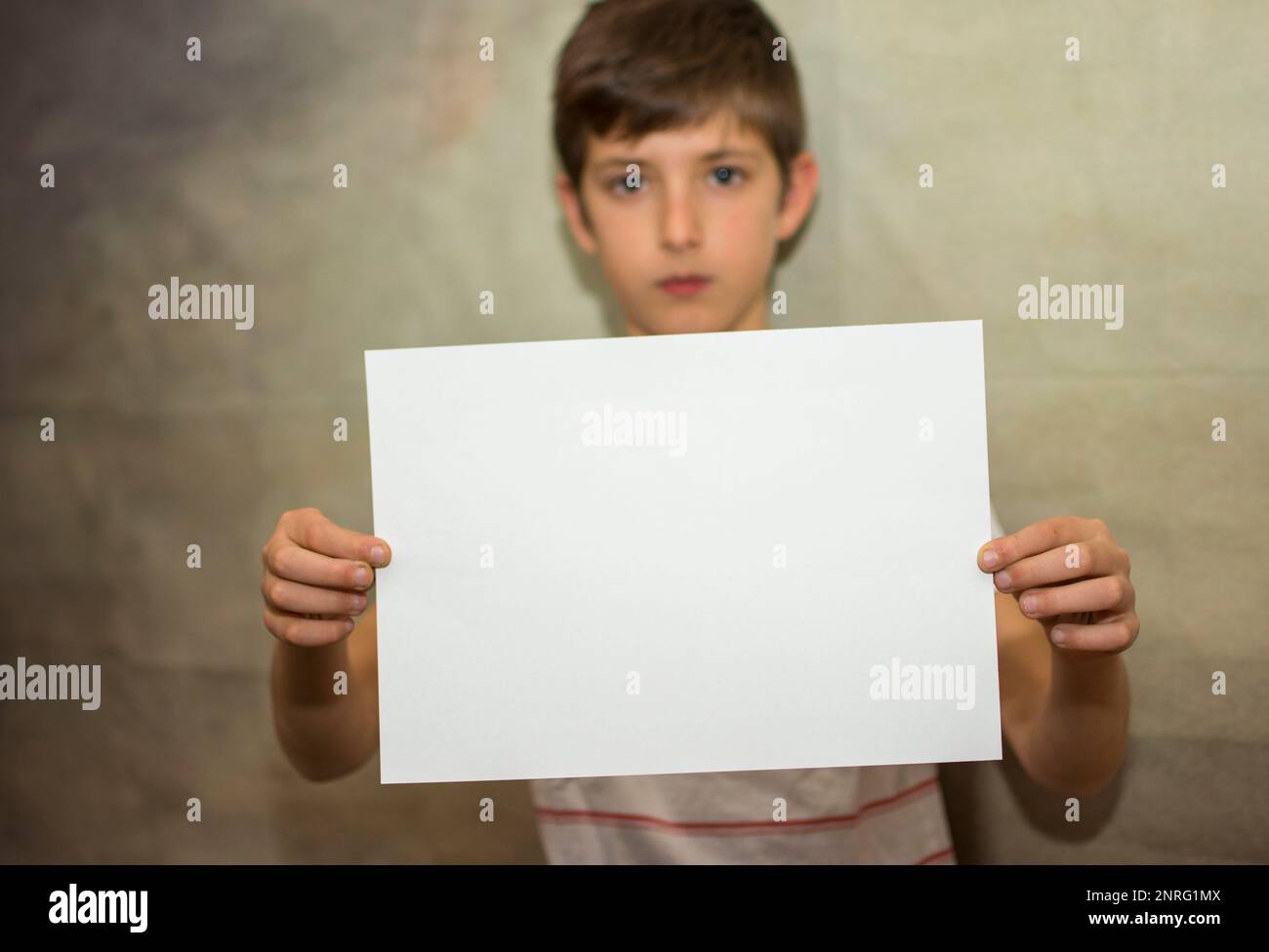 A child holding a black space for marketing designers, copy space Stock Photo