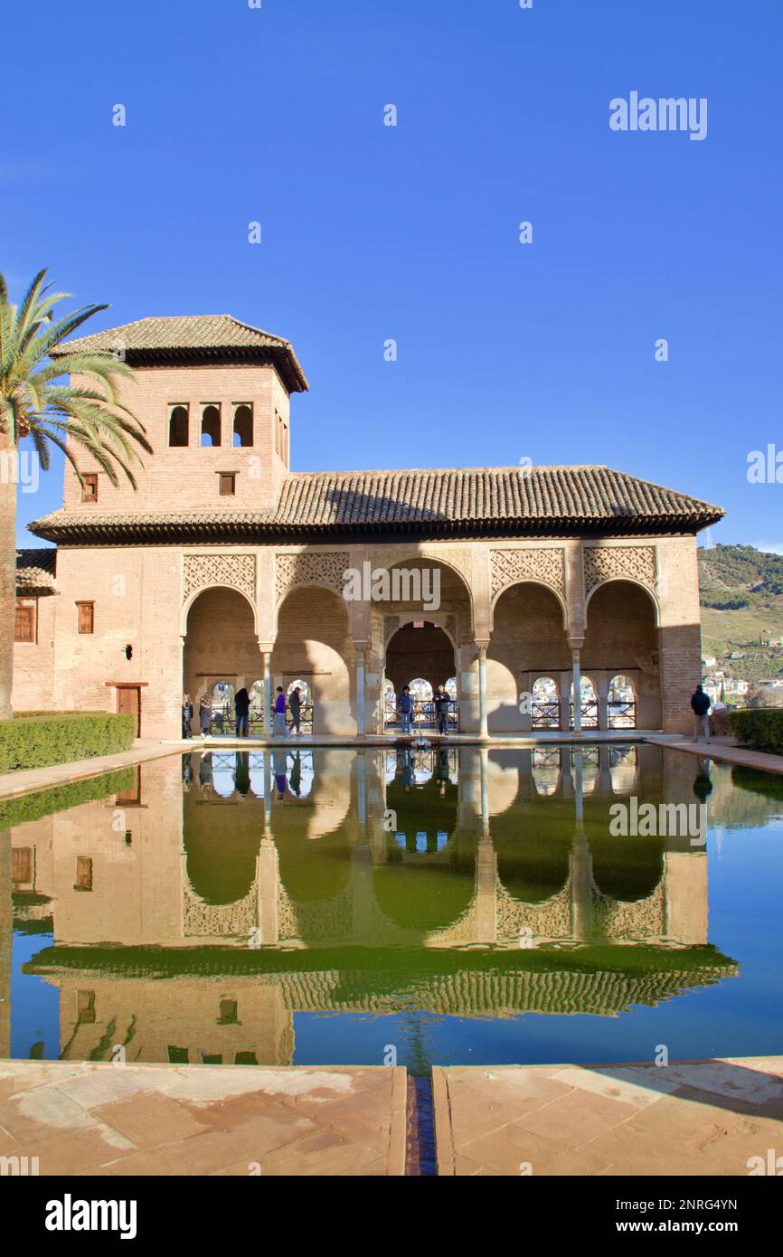reflection of the Andalusian palace on the patio fountain Stock Photo