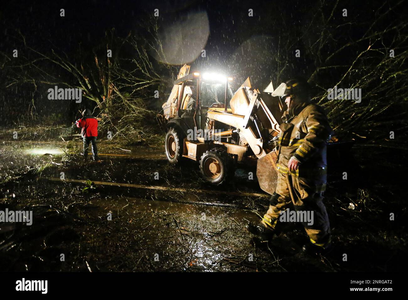 Members of the PrattsFriendship Fire Department work to check an area