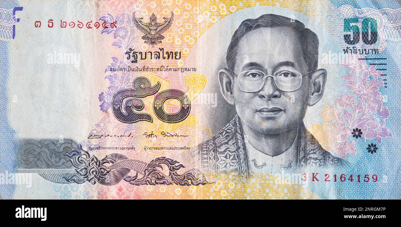 Macro detail picture with 50 thai baht banknote. Baht is the official