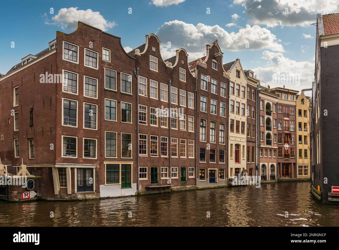Canal and typical houses of Amsterdam in Holland, Netherlands. Stock Photo