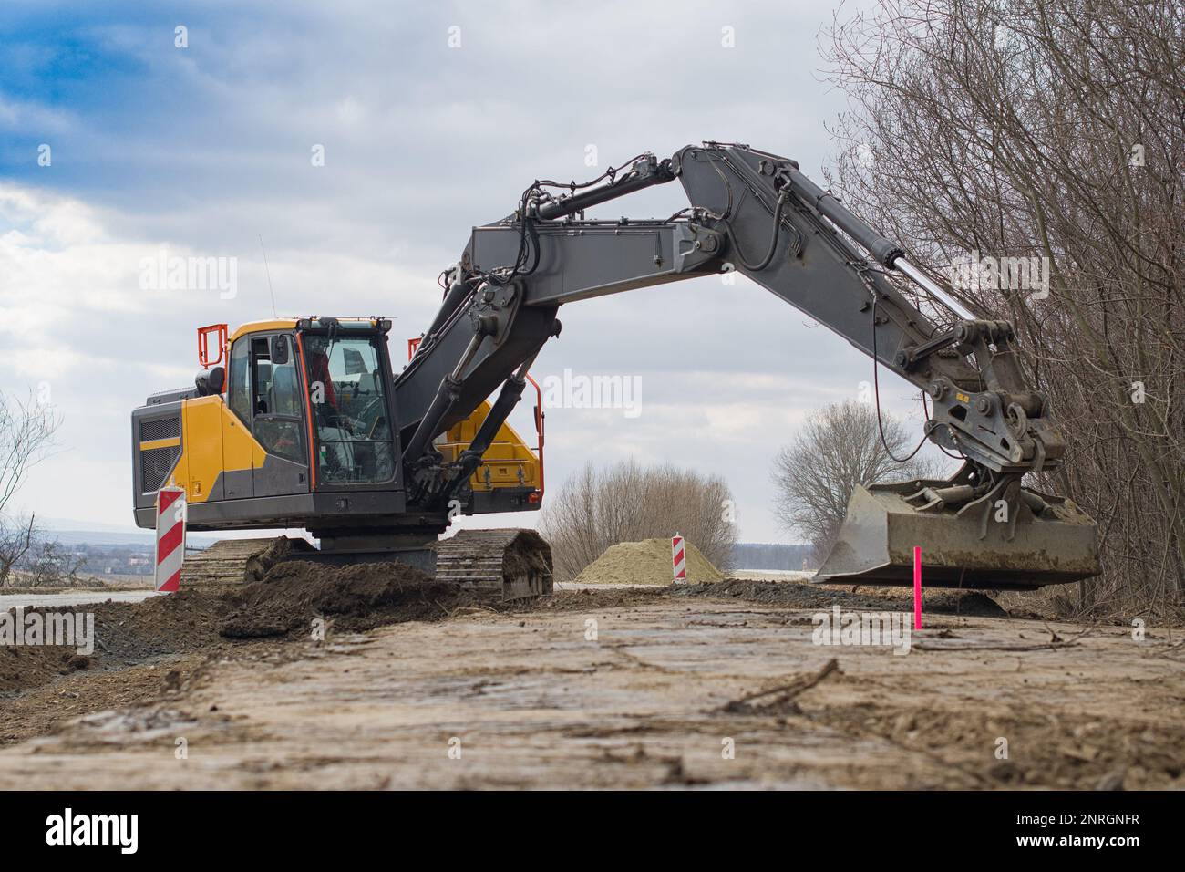 Road construction. Earth movement. Aclose up Stock Photo - Alamy