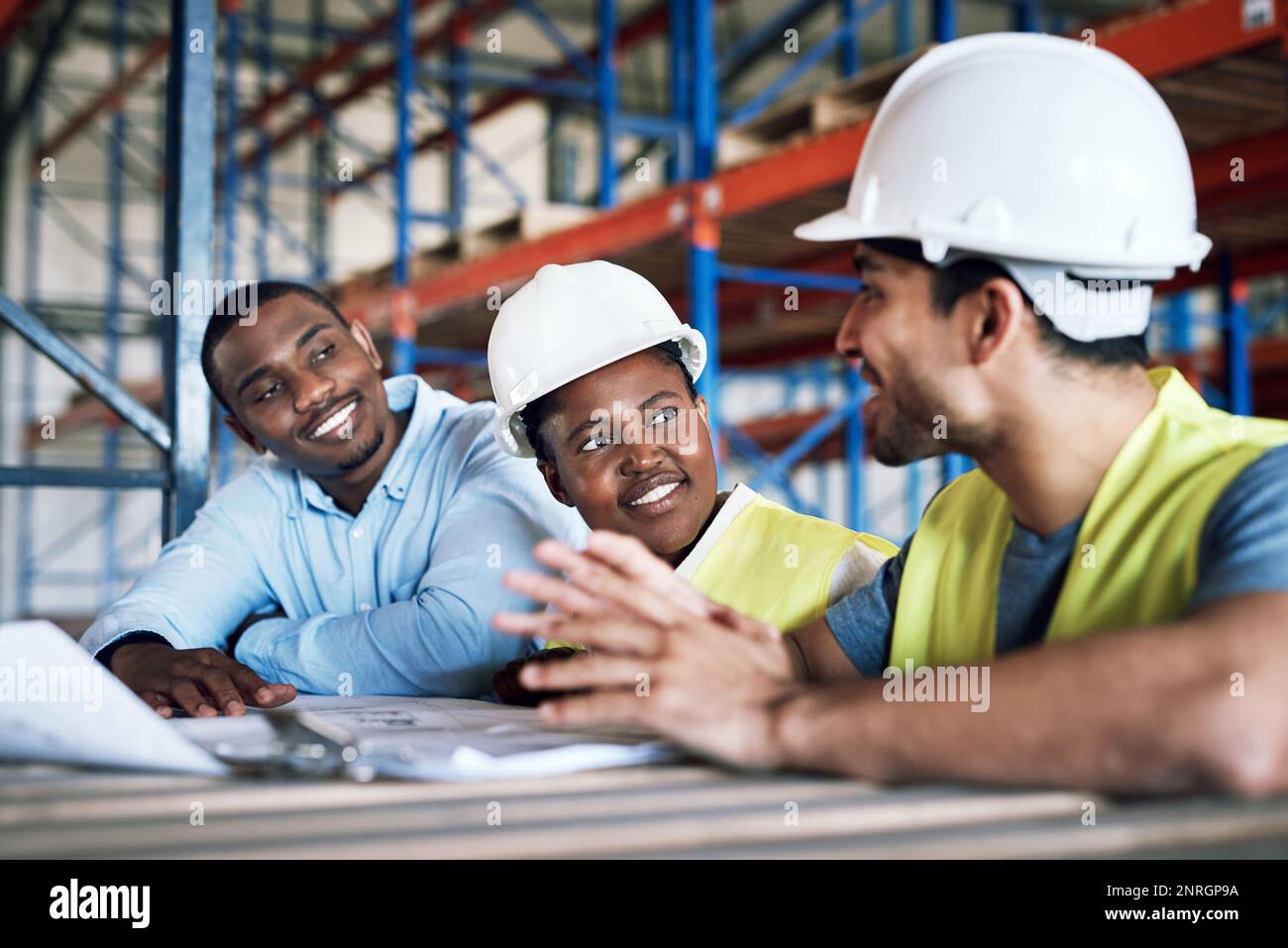 Designing the future, today. a group of builders having a meeting at a