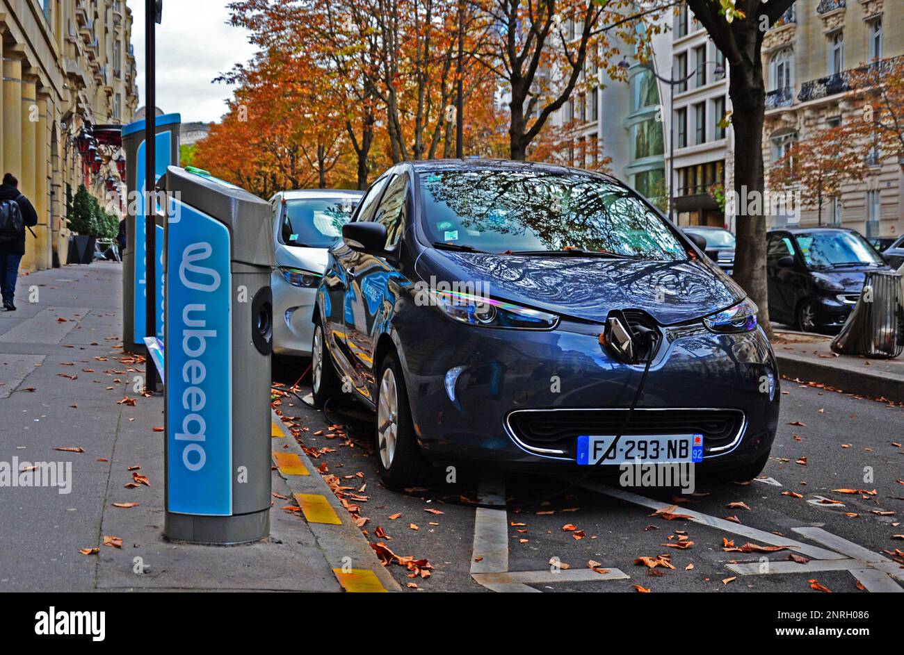 Paris, France - October 24th 2019 : Electric Renault Zoé parked in a street, in charge. This cars are the new Autolib (cars in free use service) Stock Photo