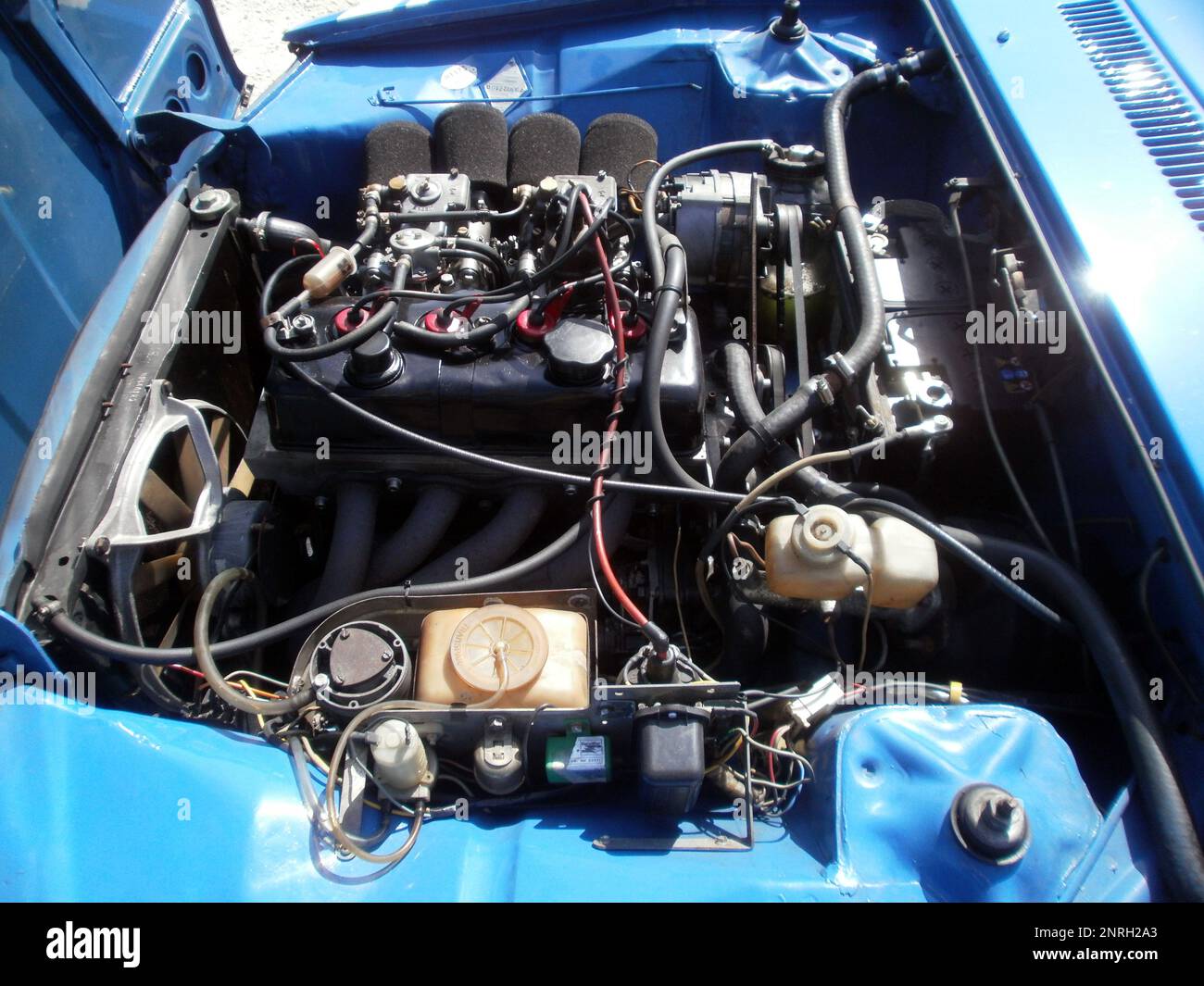 Le Bourget du lac, France - August 19th 2012 : Public exhibition of classic cars. Focus on the engine of a blue Renault Gordini. Stock Photo