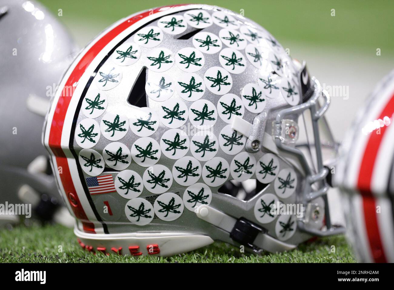 INDIANAPOLIS, IN - DECEMBER 07: The helmet of Ohio State Buckeyes  quarterback Justin Fields (1) is covered with Buckeye stickers during the  Big Ten Conference Championship football game between the Wisconsin Badgers