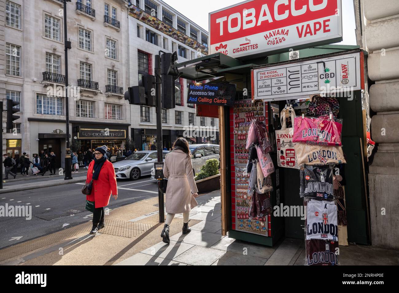 Kiosk selling Tobacco and Vape products alongside souvenirs on the corner of Piccadilly Circus, central London, England, United Kingdom Stock Photo